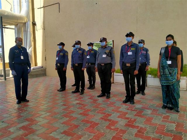 Guards on a facility floor